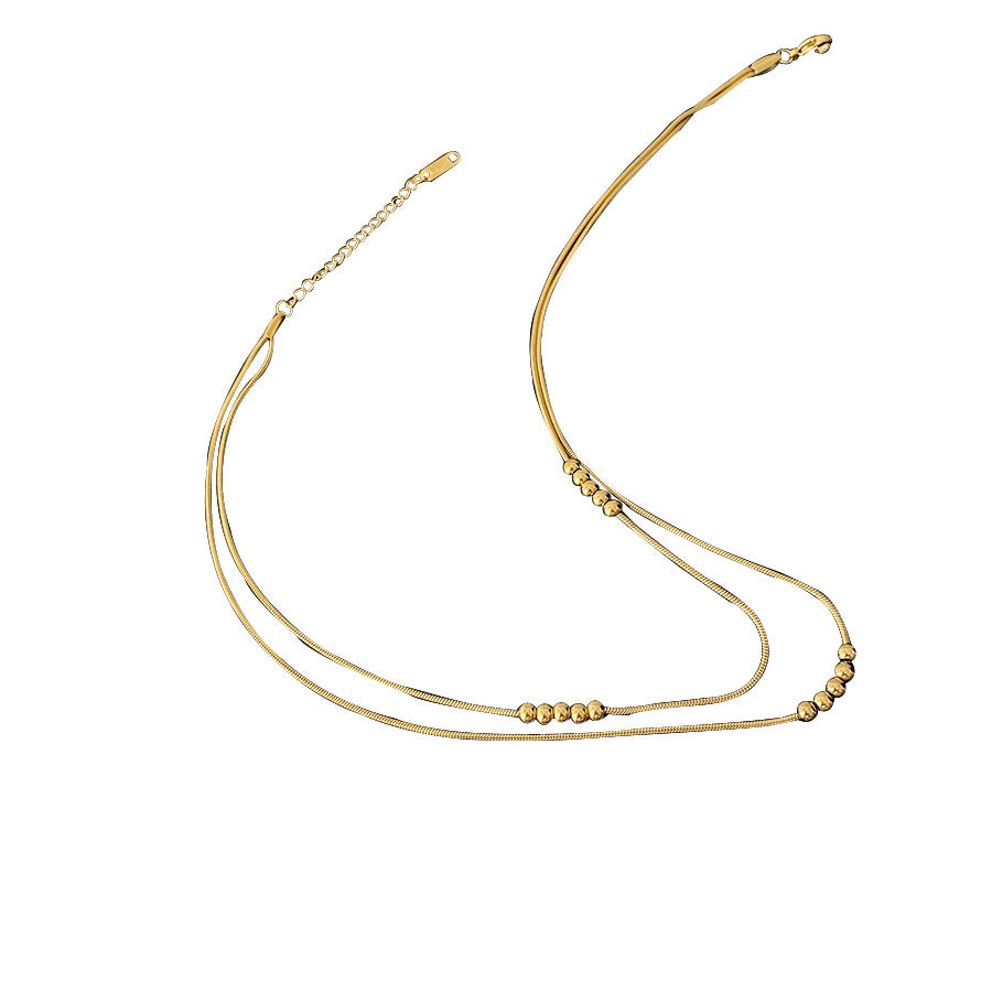 Titanium double layered necklace, anodized gold, raw titanium in silver color