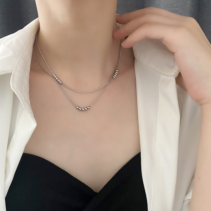 Titanium double layered necklace, anodized gold, raw titanium in silver color