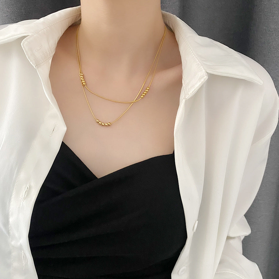 Titanium double layered necklace, anodized gold, raw titanium in silver color